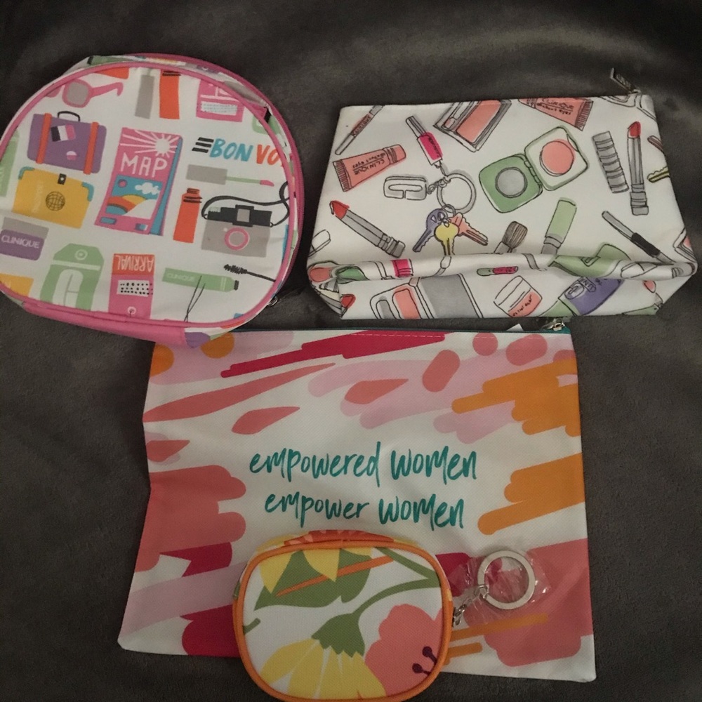 Three makeup bags and a coin purse